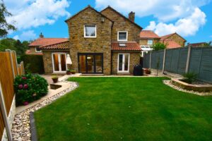 Fresh landscaped garden for stone build detached house