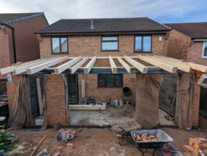 Pitched roof joists for rear extension.