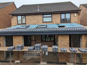 Pitched roof tiles for brickwork single storey rear extension.