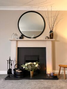 Stone surround modern fireplace.